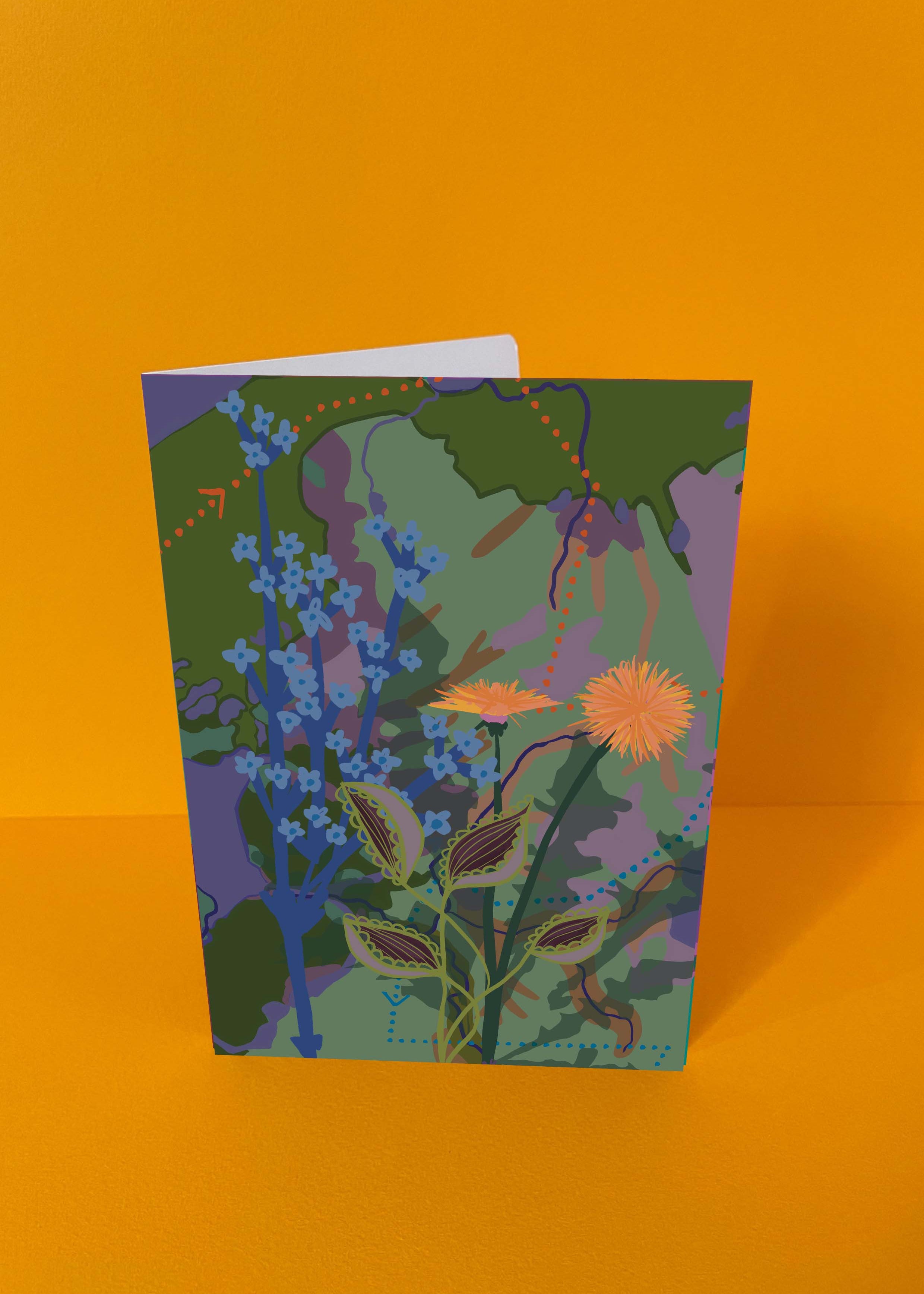 Dubbelgevouwen luxe A5-kaart van Studio LilaLine met op de voorkant een zachte illustratie van een paardenbloem in tinten groen, blauw en een vleugje geel – de bloem staat in volle pluim, met fijne lijnen die uitstralen alsof de zaadjes elk moment kunnen wegwaaien. De sfeer is teder en hoopvol. De binnenkant is blanco en ruim, perfect om iemand een liefdevolle of bemoedigende boodschap te schrijven.