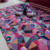 deurmat Kaleidoscope met speels caleidoscoop-patroon vol dieren en insecten van Studio LilaLine