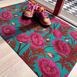 Droogloopmat met zachte lila klaprozen op een zeegroene achtergrond. Een frisse, subtiele bloemenprint die het voorjaar in huis brengt.