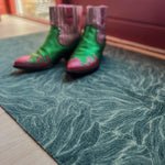 Op maat gemaakte droogloopmat Swirl in zeegroen met golvende print – frisse design deurmat voor binnen van Studio LilaLine
