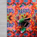 Op maat gemaakte droogloopmat Bold Retro Orange met Oranje, gele en groen retroprint – design deurmat voor binnen van Studio LilaLine
